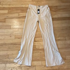 Forever 21, beige flare pants with pockets and side slits on bottom